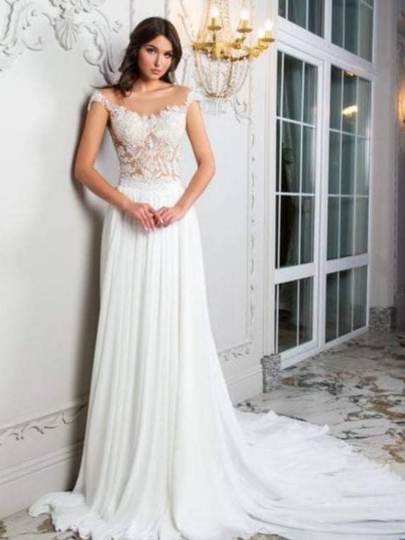 Μεταξωτό νυφικό με tatoo effect μπούστο από υπέροχη γαλλική δαντέλα και φούστα από μεταξωτή μουσελίνα. Μοναδικό νυφικό σε αέρινη γραμμή. Ελληνικής ραφής