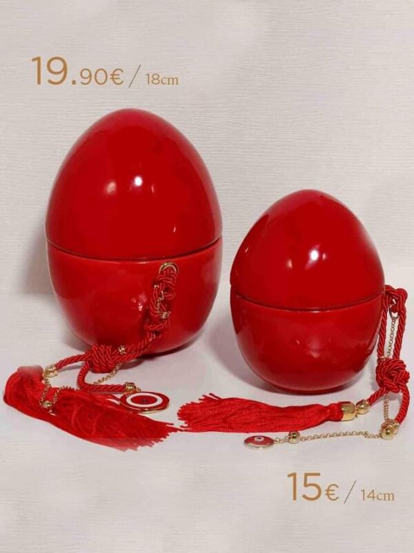 Πορσελάνινο αυγό σε κόκκινο με επίχρυσο γούρι