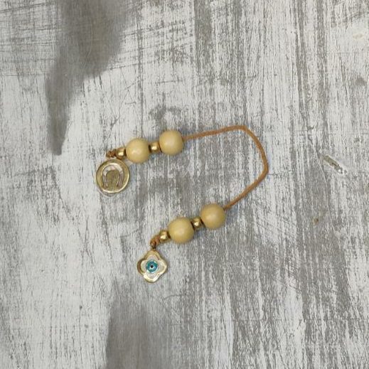 Μπεγλέρι επιχρυσωμένο διακοσμημένο με  μπεζ ημιπολύτιμους λίθους. Διακοσμητικό ματάκι. Ιδανικό δώρο για τον άνδρα!