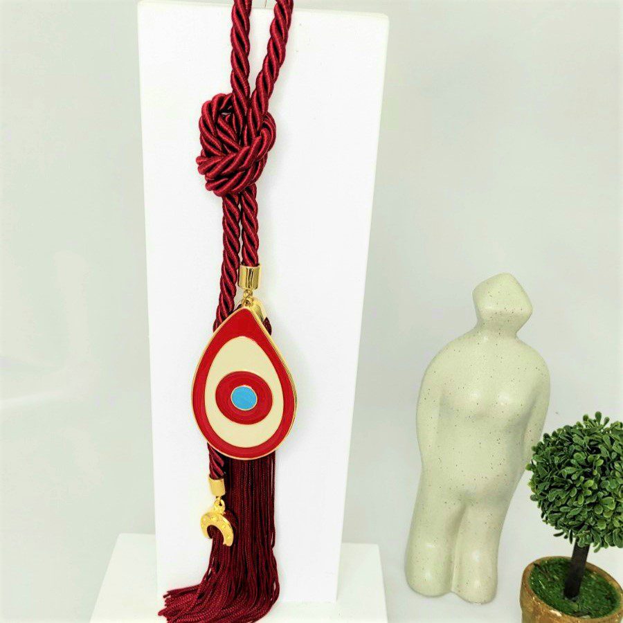 Γούρι 2022 με μάτι από σμάλτο, διακοσμητικά στοιχεία επιχρυσωμένα με 24 καράτια , με σατέν κορδόνι και μεταξωτή φούντα. Μήκος 24 εκ. Ένα πολυτελές γούρι, ιδανικό δώρο για το σπίτι ή το γραφείο