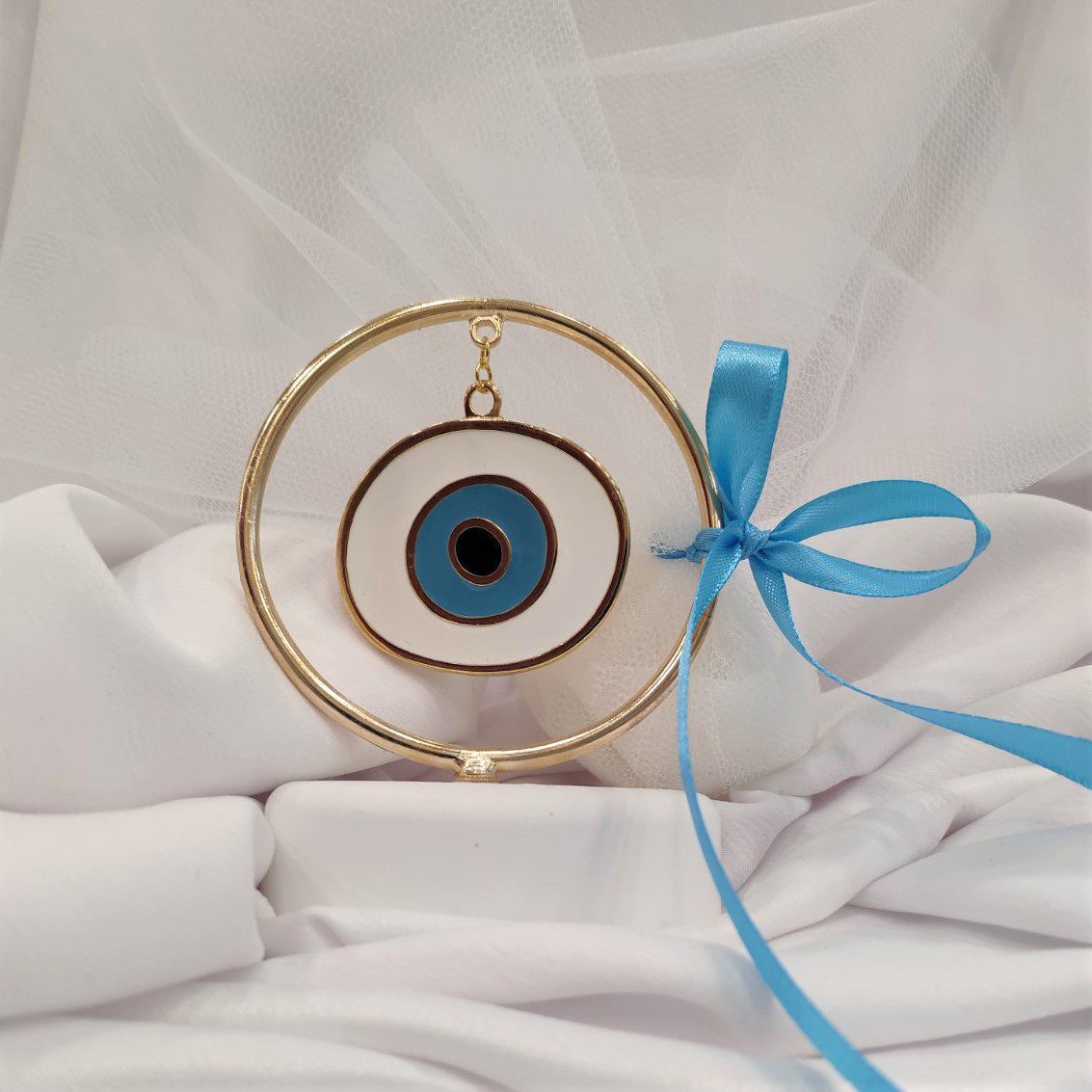 Μπομπονιέρα με λευκό βότσαλο και επίχρυσο Ματάκι