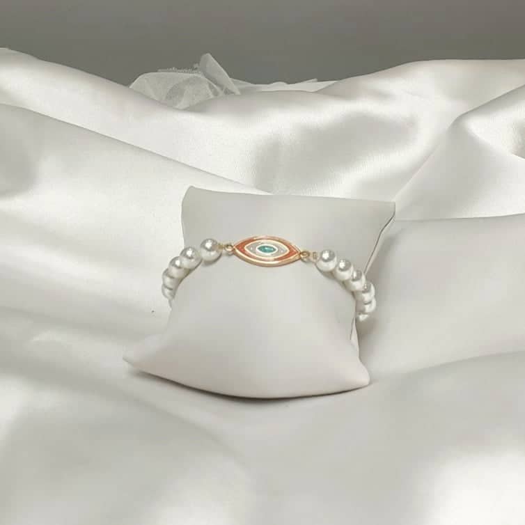 Βραχιόλι με μαργαριτάρια και μάτι με σμάλτο