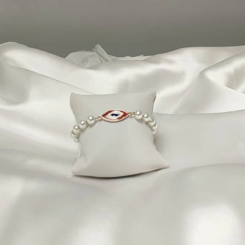 Βραχιόλι με μαργαριτάρια και μάτι με σμάλτο