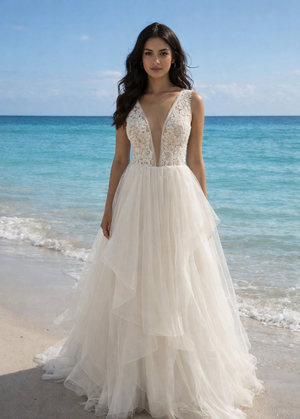 Αέρινο ρομαντικό νυφικό με βαθύ ντεκολτέ, φίνα δαντέλα και κεντημένο μπούστο.